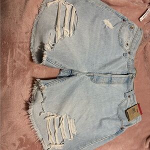 Levi's 501 high-rise distressed denim shorts.